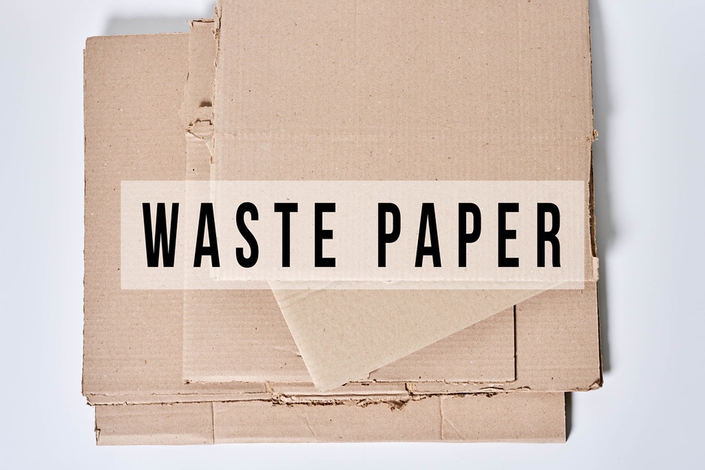 heap-of-cardboard-for-recycling-with-text-waste-paper
