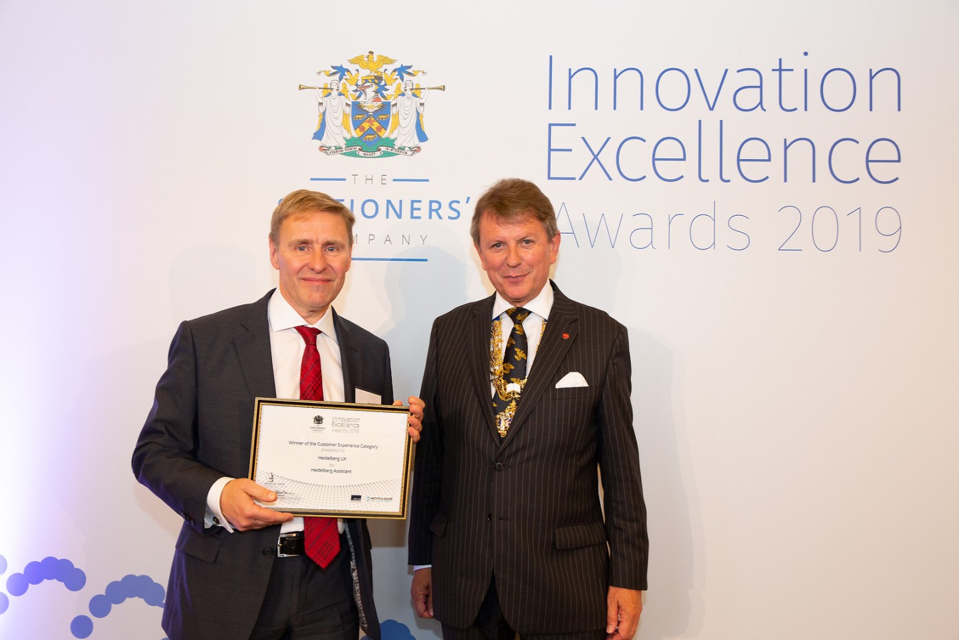 Innovation_Awards_2019_Ian_Wilcock_accepts_the_certificate_for_the_Winner_of_the_Customer_Experience_Category_from_Master_David_Allan