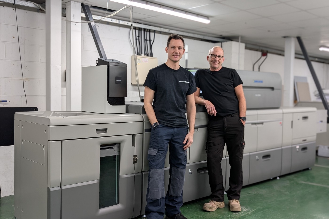 From_left_to_right_Chris_Woodward_and_Gary_Owens_Healeys_Printers